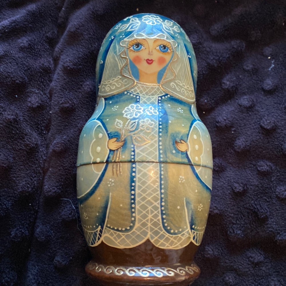 Nesting doll. She’s missing her sisters, so only 1 piece